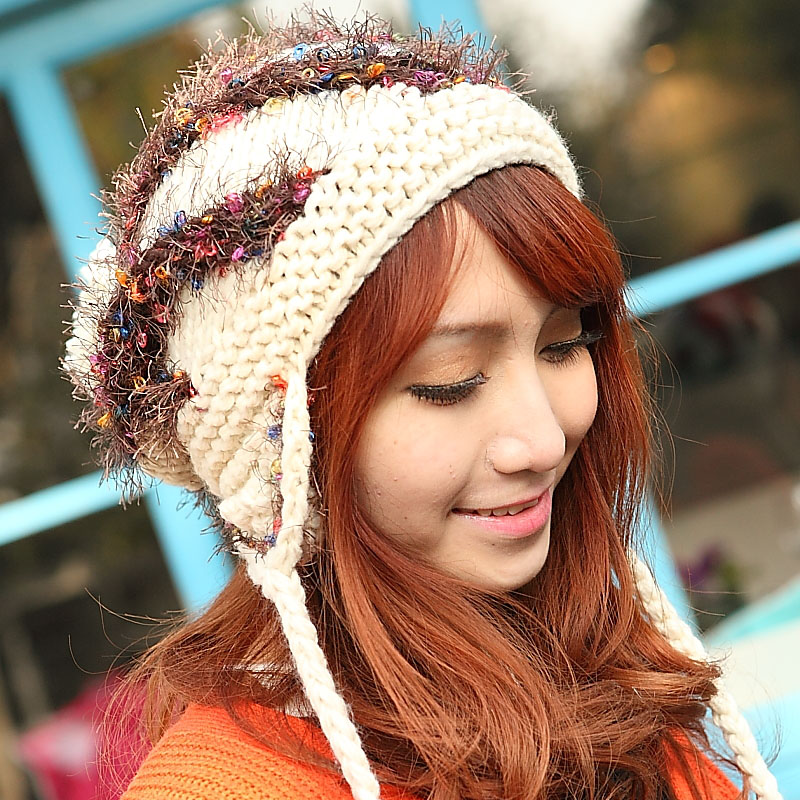 16 autumn and winter thermal women's wool ball hat pigtail yarn 21-year-old knitting wool cap millinery