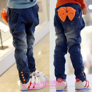 2012 girl's bow water wash jeans button pants,children's winter add wool money upset jeans