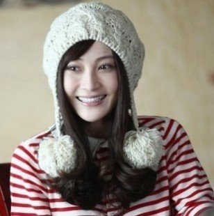 2012 New ladies' fashion hats arrive in Autumn&Winter.Knitted hat with lovely pompons in solid color,Protective cap hotsell.