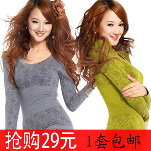 2013 Autumn and winter o-neck body shaping thermal underwear set modal seamless beauty care Women's underwear New