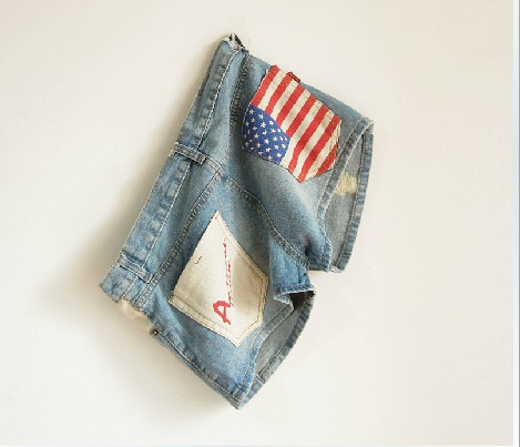 2013 Summer new version of the European and USA Stars and Stripes USA flag style leg light blue holes in low-waist denim shorts