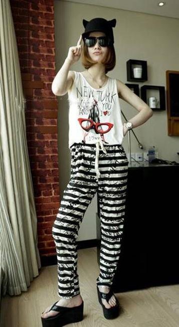 A women's dress popularity boom letters stripe vest joining together loose pants of conjoined twins