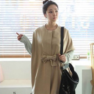 Autumn and winter hot-selling bow belt loose cloak trench / free shipping