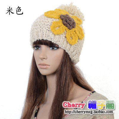 Autumn and winter solid color thermal knitted hat fashion sweet little flower handmade women's knitted hat