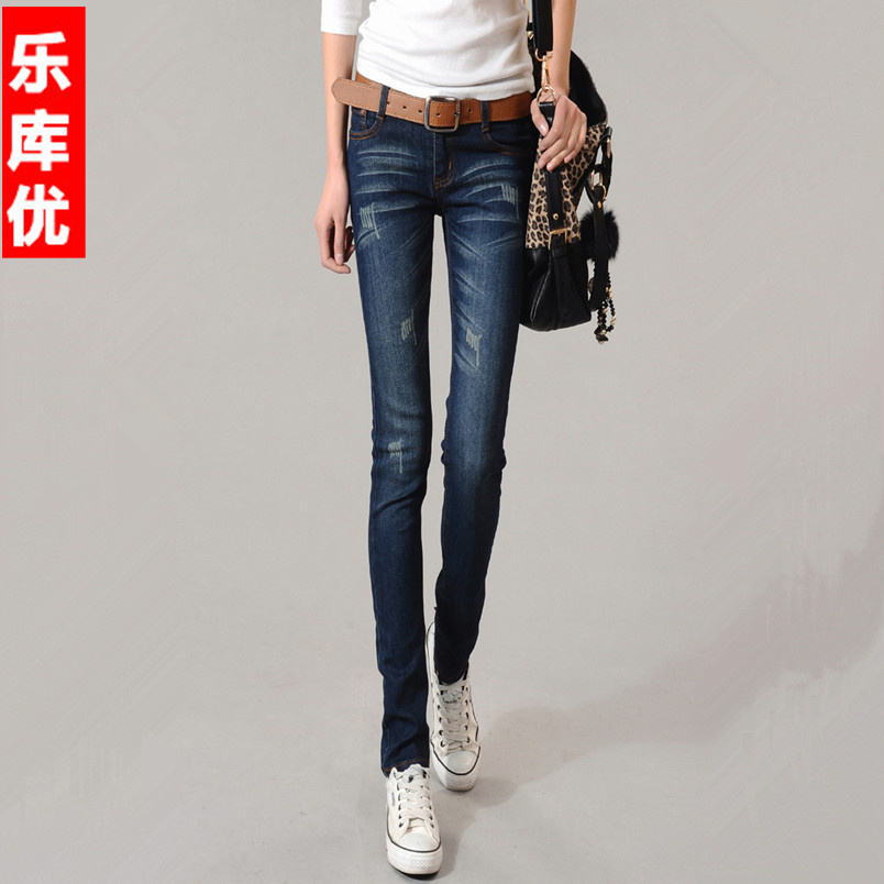 Cat wearing white tight elastic pencil jeans low-waist female trousers 2012
