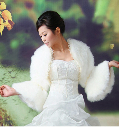 Fashion, classic new bridal shawl jacket, faux fur.  Ivory