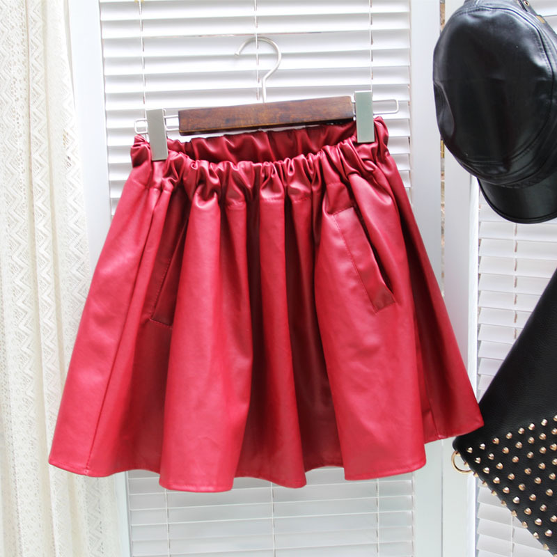 Fashion vintage high quality double pocket high waist bud expansion bottom puff skirt leather skirt PU short skirt bust skirt