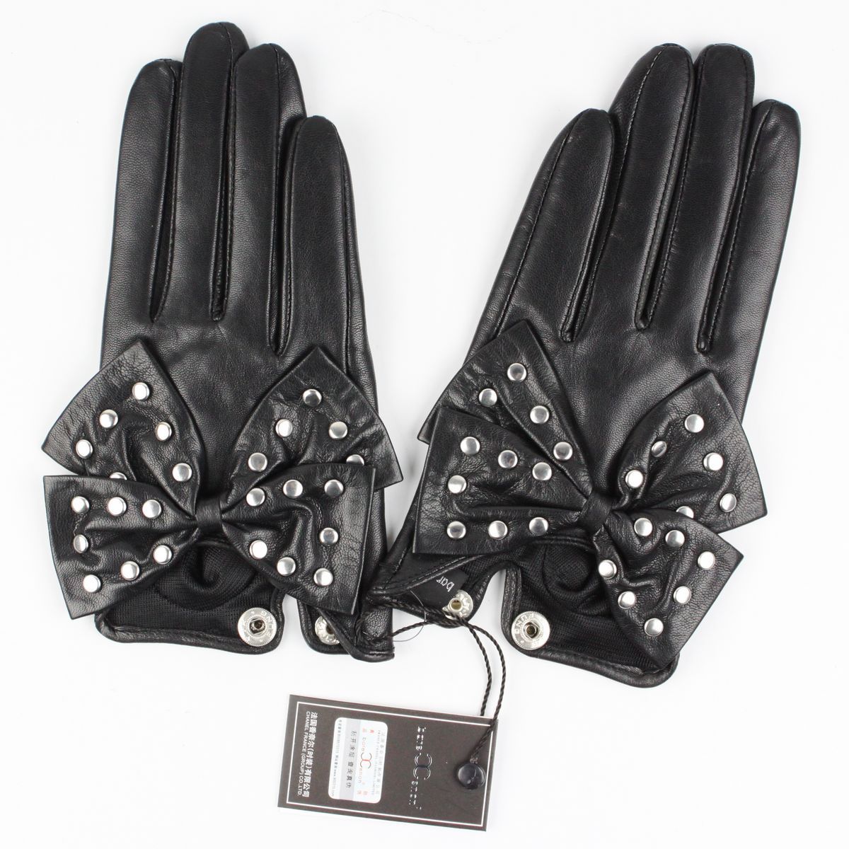 Free shipping 800 women's genuine leather gloves women's short design oversized bow rivet sheepskin gloves