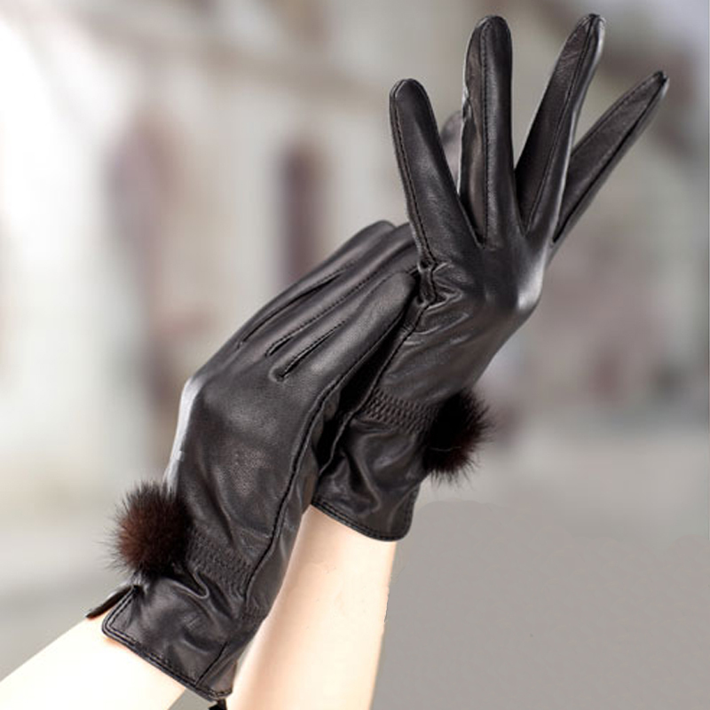 FREE SHIPPING Autumn and winter women's leather gloves cute rabbit fur ball  thermal leather gloves