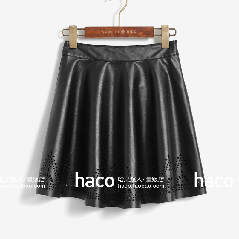 Free shipping Fashion vintage flower cutout expansion bottom high waist leather short skirt half-length PU lining