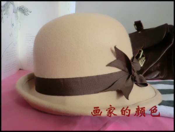 Free shipping Fashion woolen fedoras camel roll-up hem bucket hats autumn and winter female bow chromophous