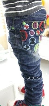 Free shipping Korean red crown of 2011 wild boys Girls neutral printing digital children jeans trousers