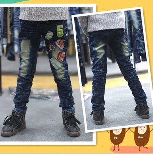 free shipping Korean version of the cartoon images 9829/1009/15 male / female models children denim trousers