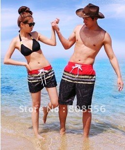 Free Shipping the price of two Flame pattern  couple beach pants women/men shorts of beach style trousers in stock