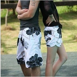 Free Shippingthe two pairs of trousers Price Black and white flowers of couple beach pants women/men in stock