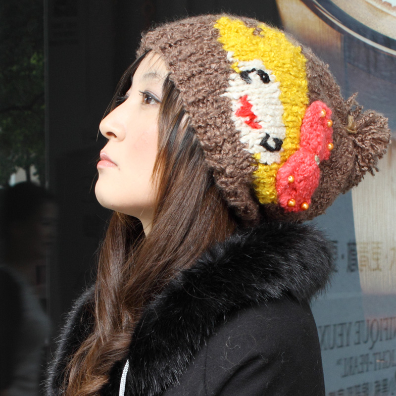 Hot-selling 8229 female bow pearl smiley knitted hat china doll hat
