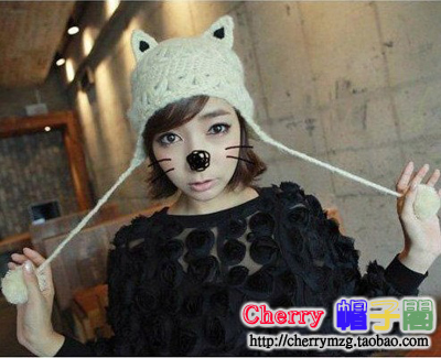 Hot-selling devil horn handmade autumn and winter knitted hat cat ears women's hair ball knitted hat