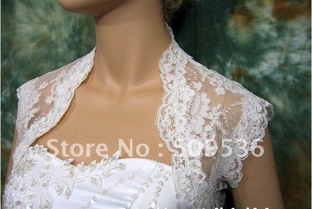 Stunning   2011  Ivory sleeveless alencon lace bolero jacket Size: Main