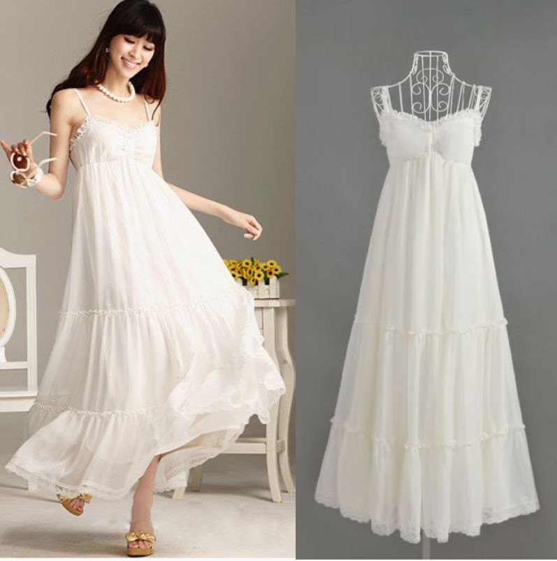 The new bohemian white fairy chiffon lace harnesses beach dress put on a large