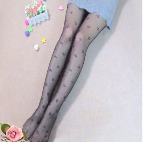 The new style skinny thin mesh big clovers stockings jacquard tights